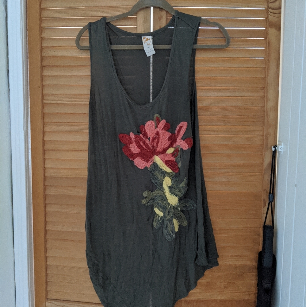 Looking to buy Anthropologie Woman's green tank